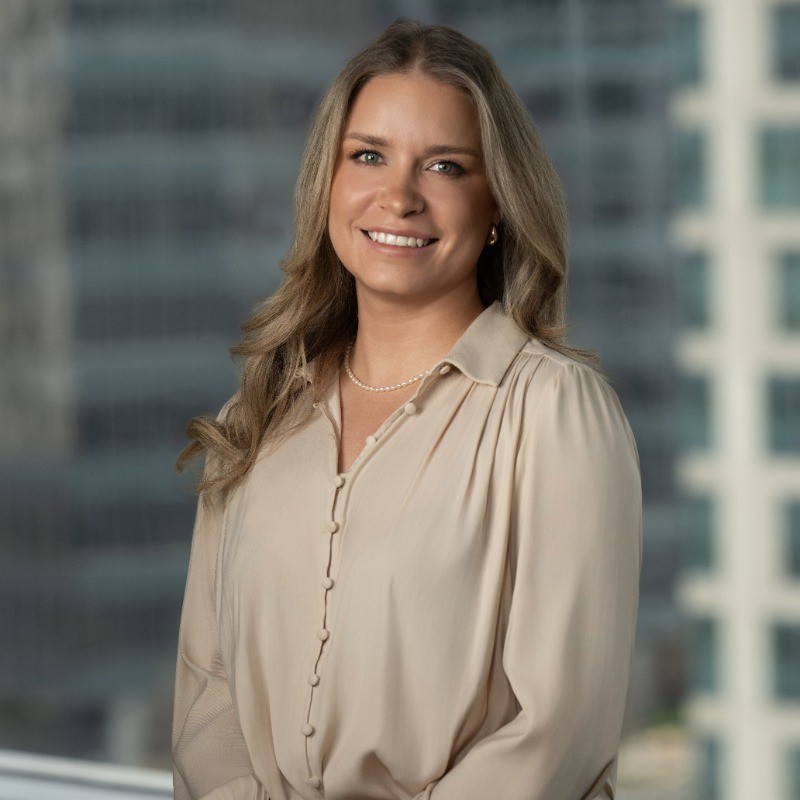 A professional picture of Regina Stickney Sangines, a Career Self-Discovery Program alumni and success story.