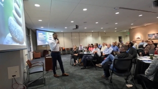 Coach John Marshall delivering a presentation at NASMs leadership forum